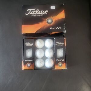 Titleist Pro V1 Golf Balls in Black and Orange Packaging